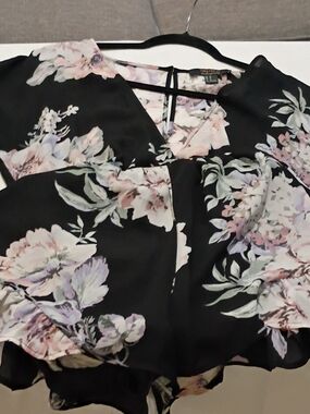 torrid Black Jumpsuit with Pastel Floral Print